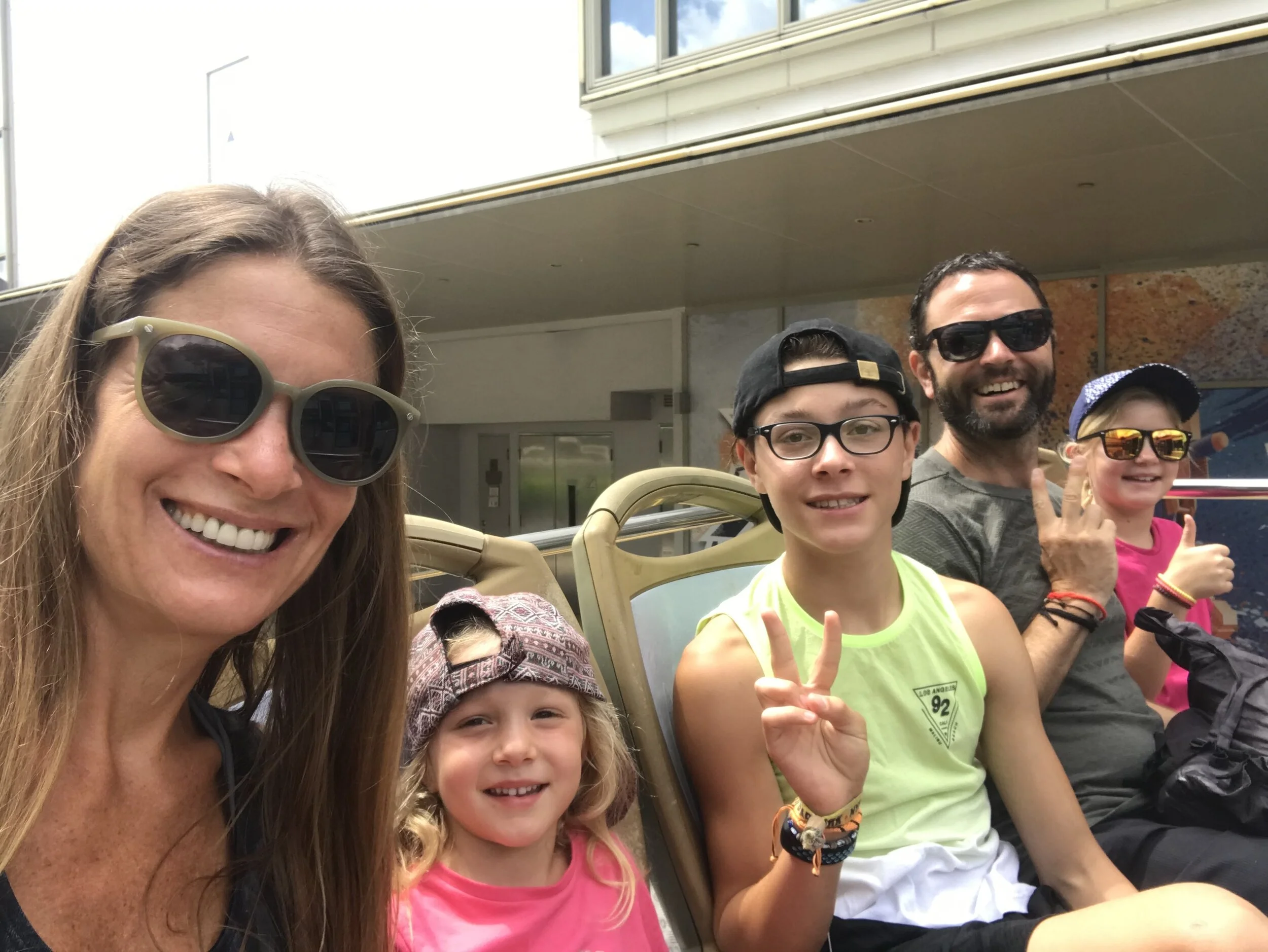 We are on top of the Hop on hop off bus cruising around town